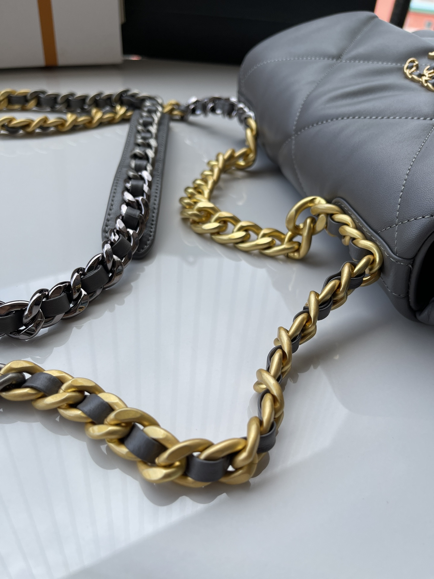 Ch*el 19 handbag shiny leather, gold-tone, silver-tone & ruthenium-finish metal dark gray 6.2 × 10.1 × 3.5 in