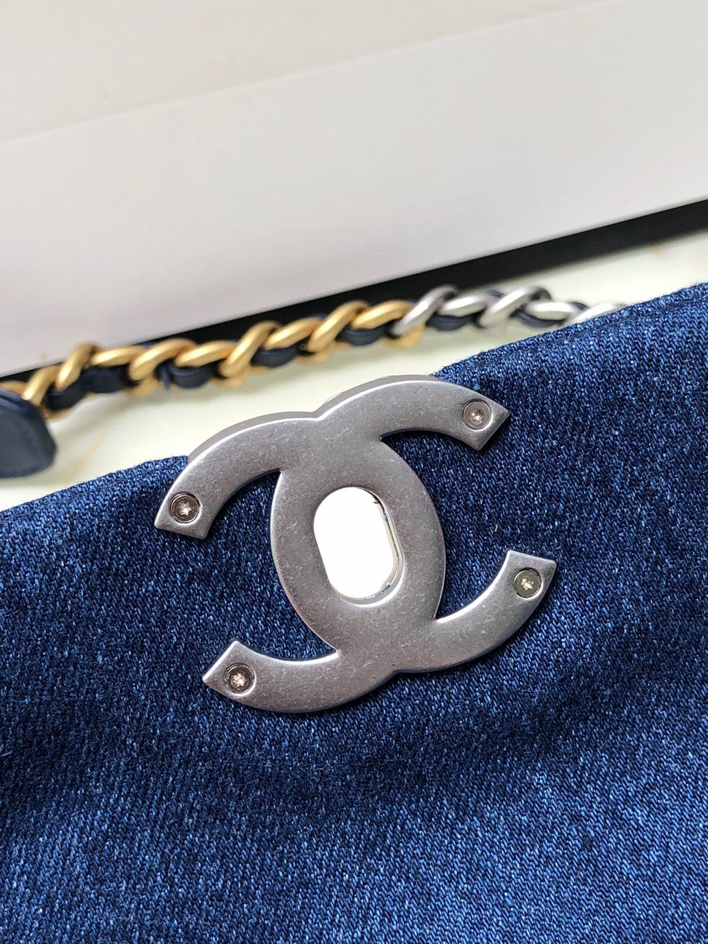 Ch*el 19 handbag, gold-tone, silver-tone & ruthenium-finish metal navy 6.2 × 10.1 × 3.5 in