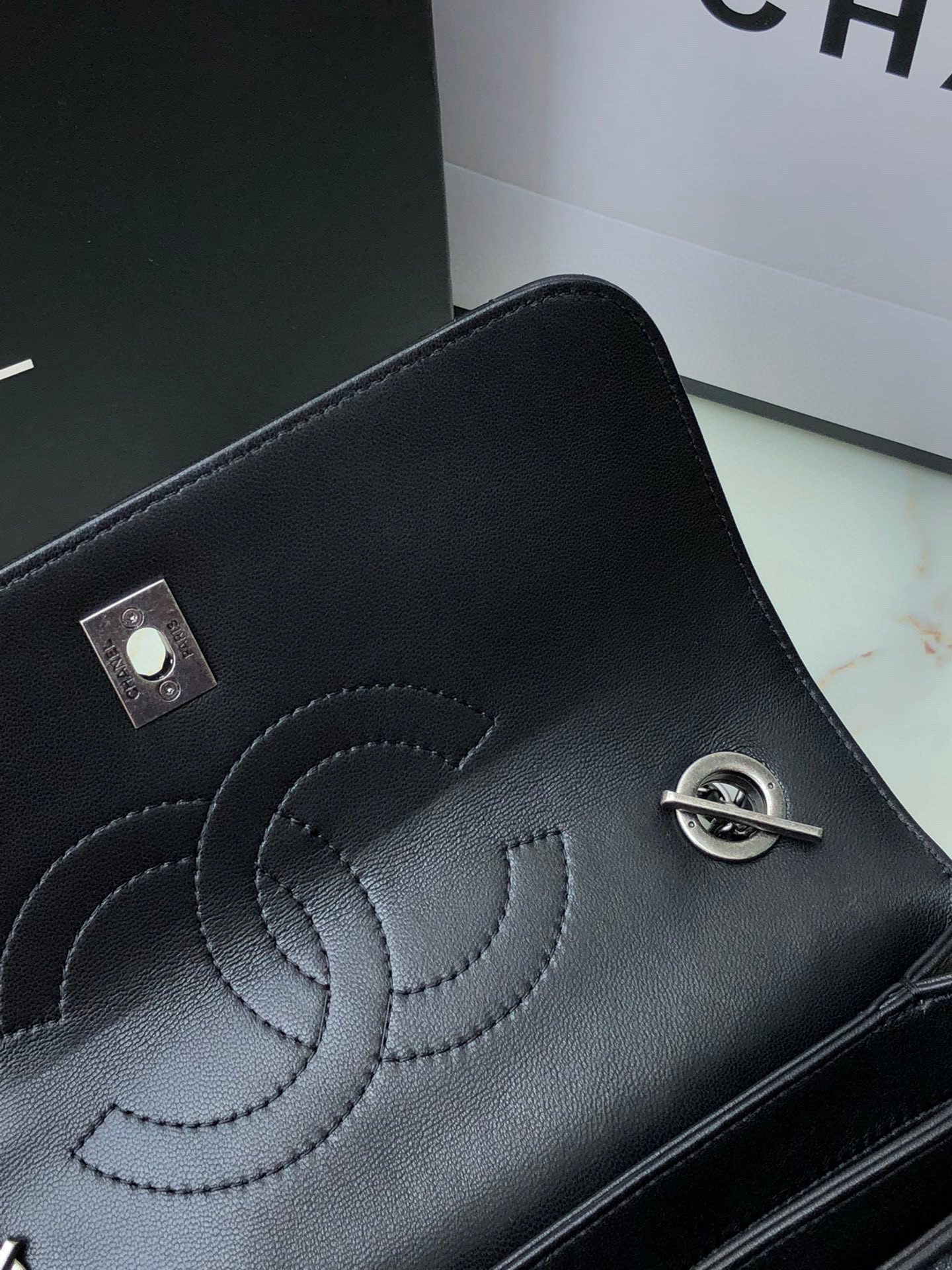 Ch*el flap bag with top handle 6.6 × 9.8 × 4.7 in