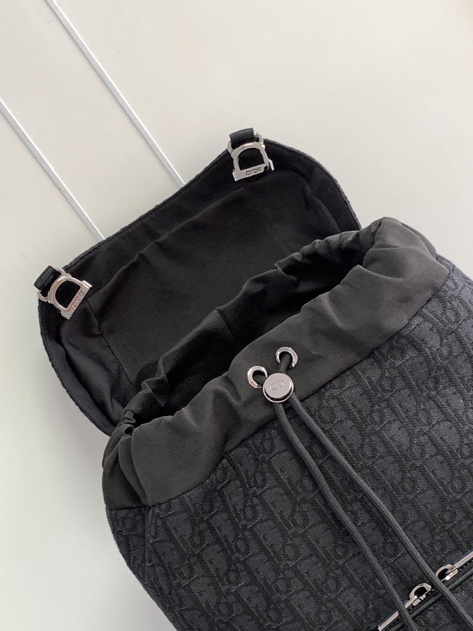 D*or 8 backpack with flap black D*or oblique jacquard 31 x 48 x 16.5 cm